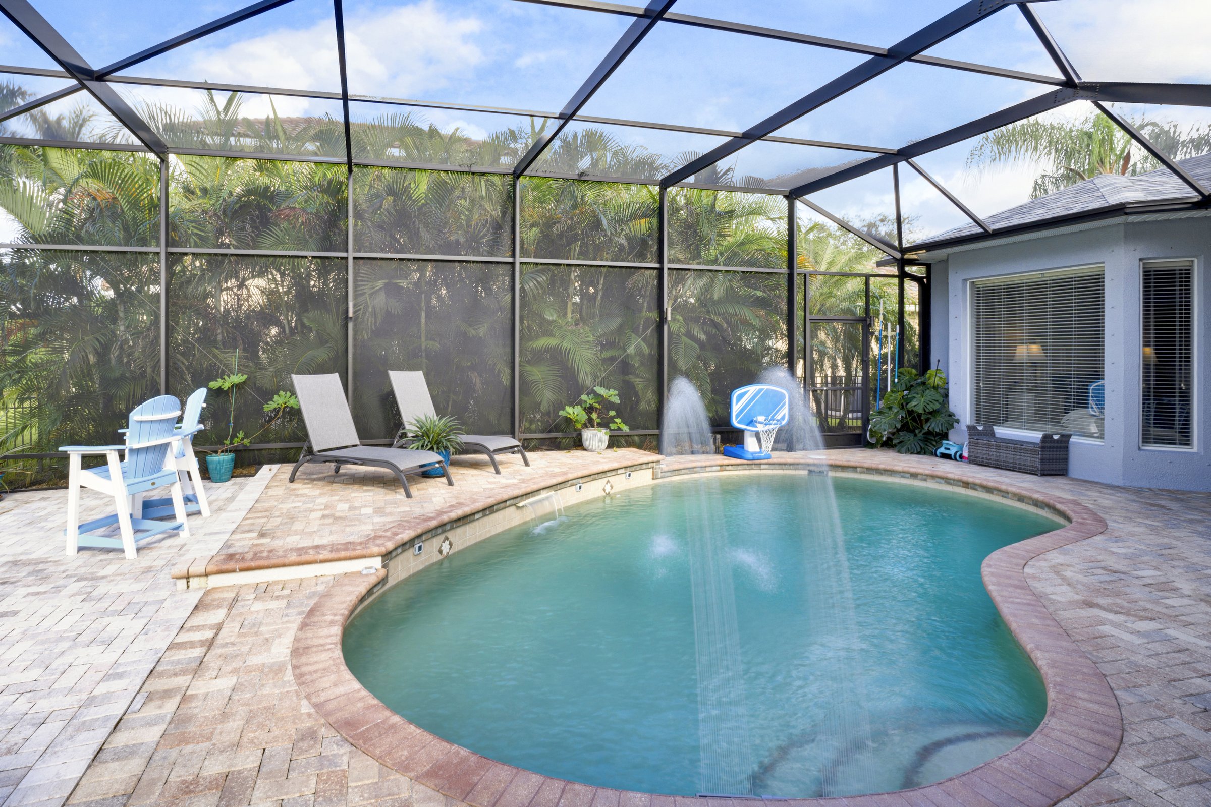 Screened pool with fountains