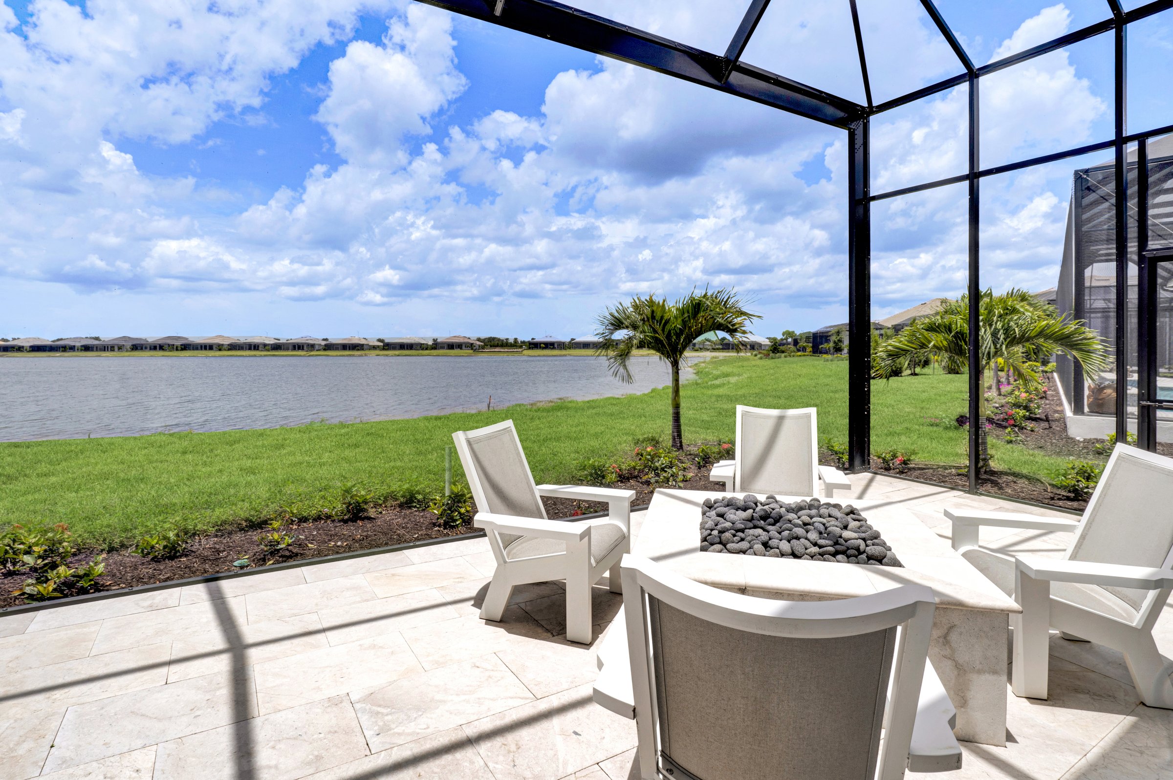 Lakefront fire pit at a Sarasota luxury home