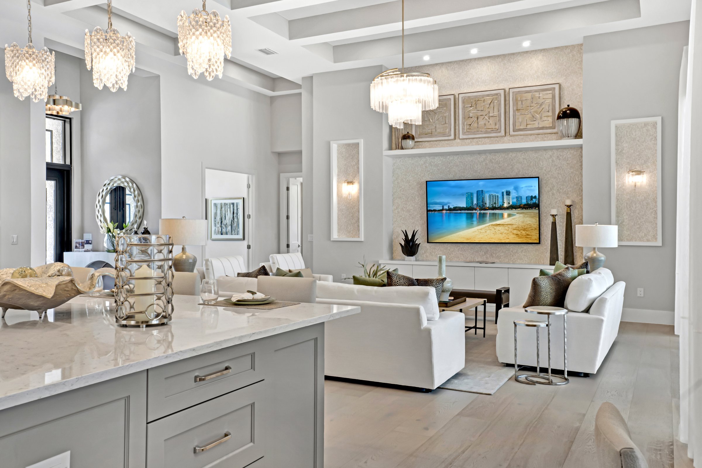 Open-concept living, dining, and kitchen in a luxury Sarasota home — real estate photography